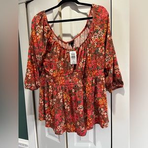 Torrid 2 Orange floral print pullover blouse. On/off shoulder, shaped
